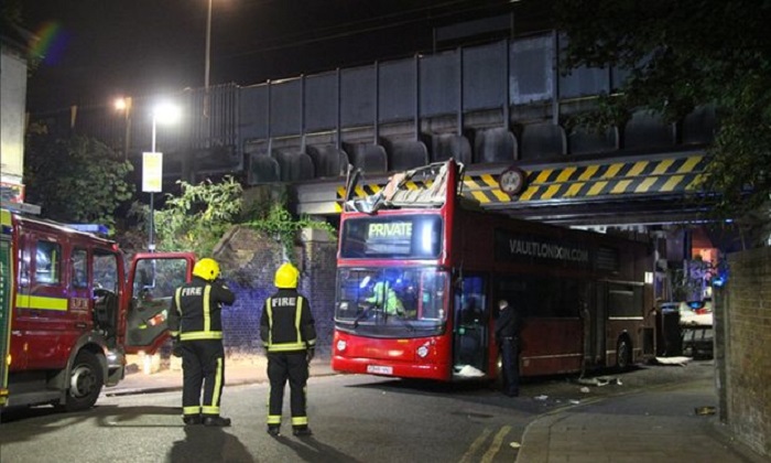 Five taken to hospital as bus crashes into Tottenham bridge